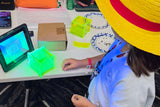 Class runner Emily Key brought her blacklight to show just how reactive the green acrylic was when exposed to the light.